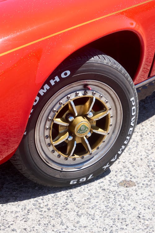 Photo of a Red Car's Tire