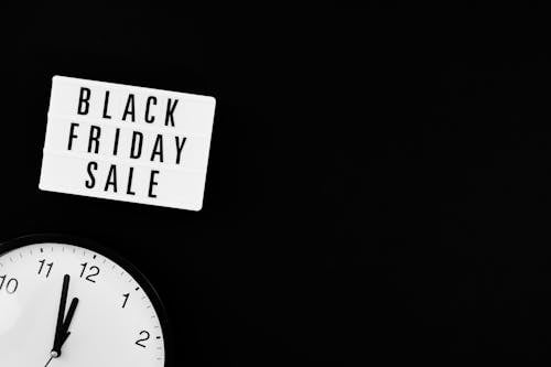 Free A Black Friday Sale Signage on Black Background Stock Photo