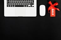 Macbook Pro Beside A Mouse