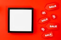 White Light With Black Frame On Red Background