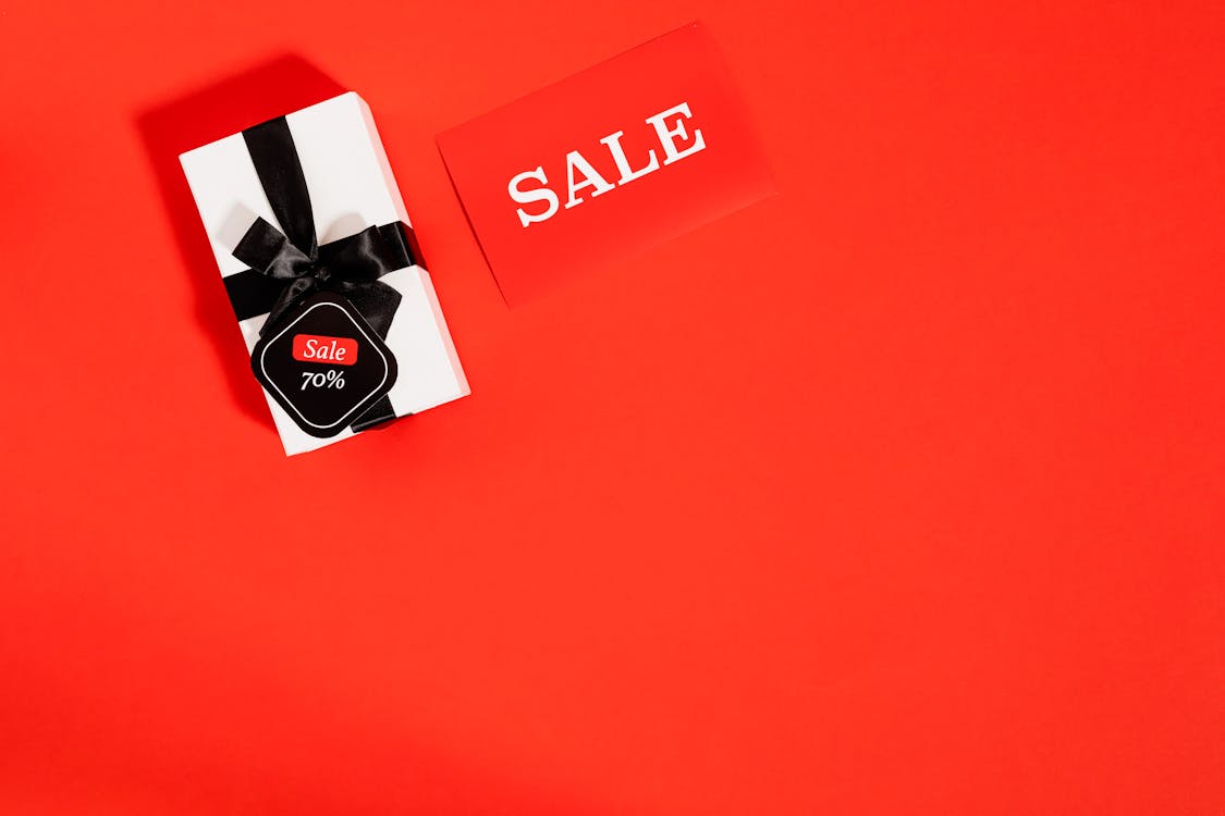Free Gift Box With Black Ribbon For Black Friday Sale Stock Photo