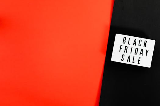 Black Friday sale sign on a contrasting red and black background, ideal for retail and marketing use.
