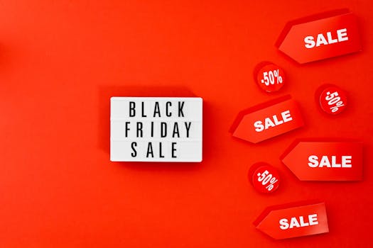 Eye-catching Black Friday sale display with discounts on a bold red background.