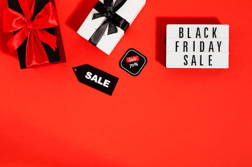 Free Black Friday Sale on Red Background Stock Photo