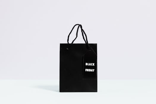 Black Friday shopping bag displayed on a minimalist background, perfect for sale promotions.