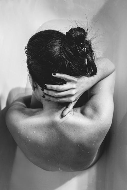 Free Monochrome Photograph of a Woman in a Bathtub Stock Photo
