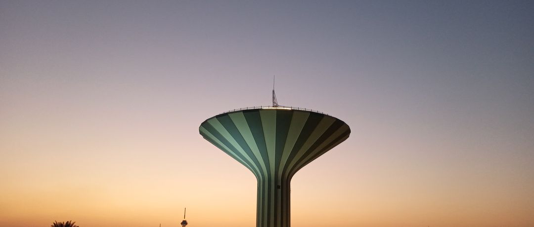 Beautiful view of Riyadh Water Tower silhouetted against a stunning sunset sky., Riyadh, Saudi Arabia, stay connected here with a travel eSIM