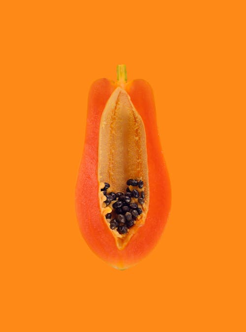 Close Up Photo of Sliced Papaya