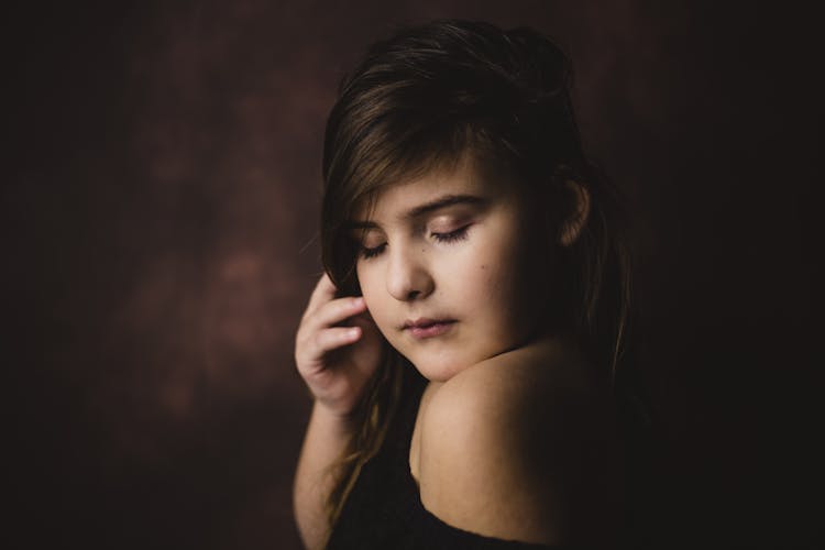 Trendy Dreamy Girl With Makeup On Brown Background