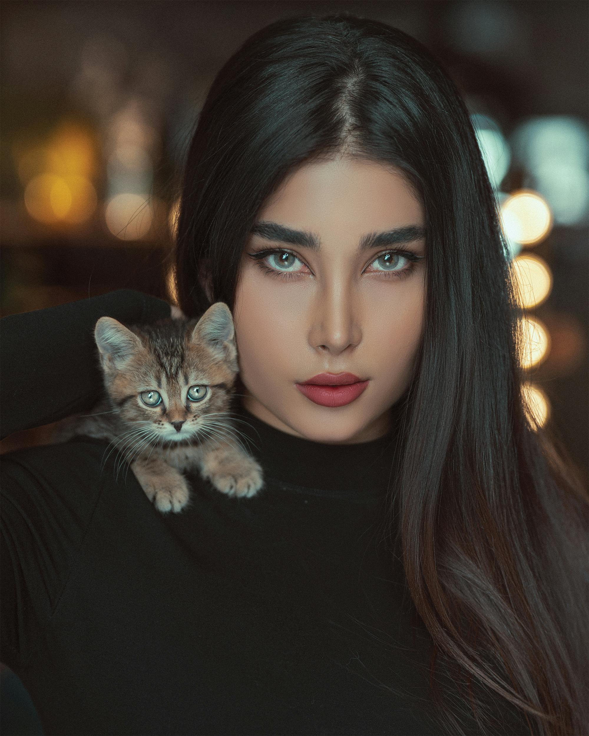 A Kitten on a Woman's Shoulder · Free Stock Photo A Kitten on a Woman's Shoulder · Free Stock Photo