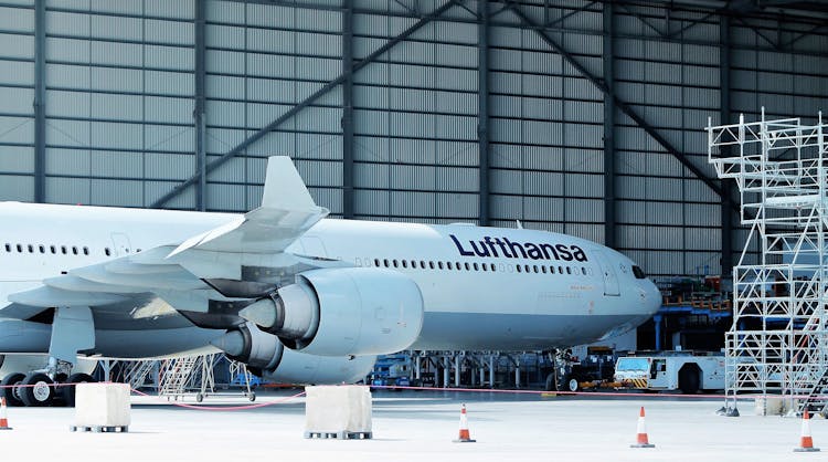 A Commercial Airplane In A Hangar