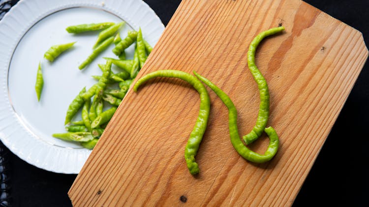 Green Hot Pepper On Cutting Board And Plate