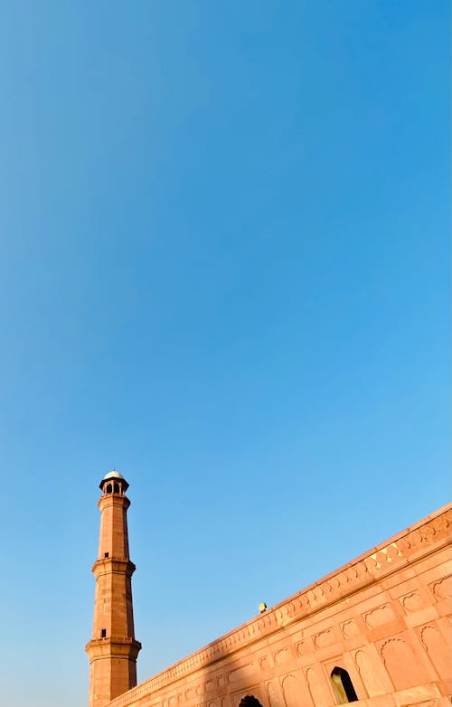 Free 
A Minaret under a Blue Sky Stock Photo
