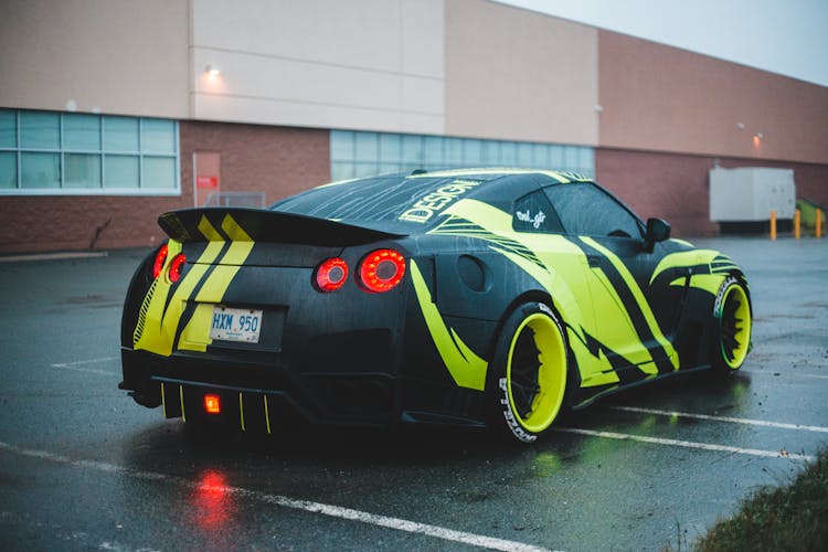 Sport Car On Wet Parking Lot