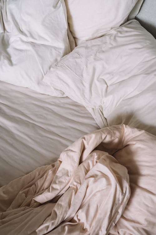 Pillows and Blanket on the Bed