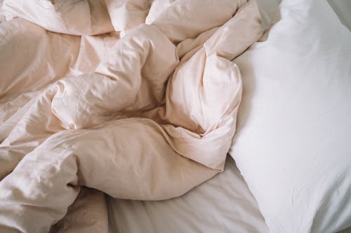 Free 
A Comforter on a Bed Stock Photo