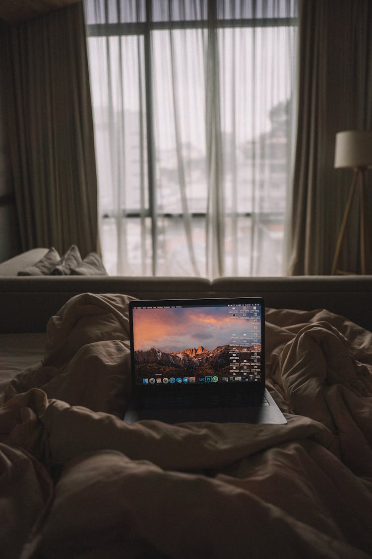 
A Laptop In Bed