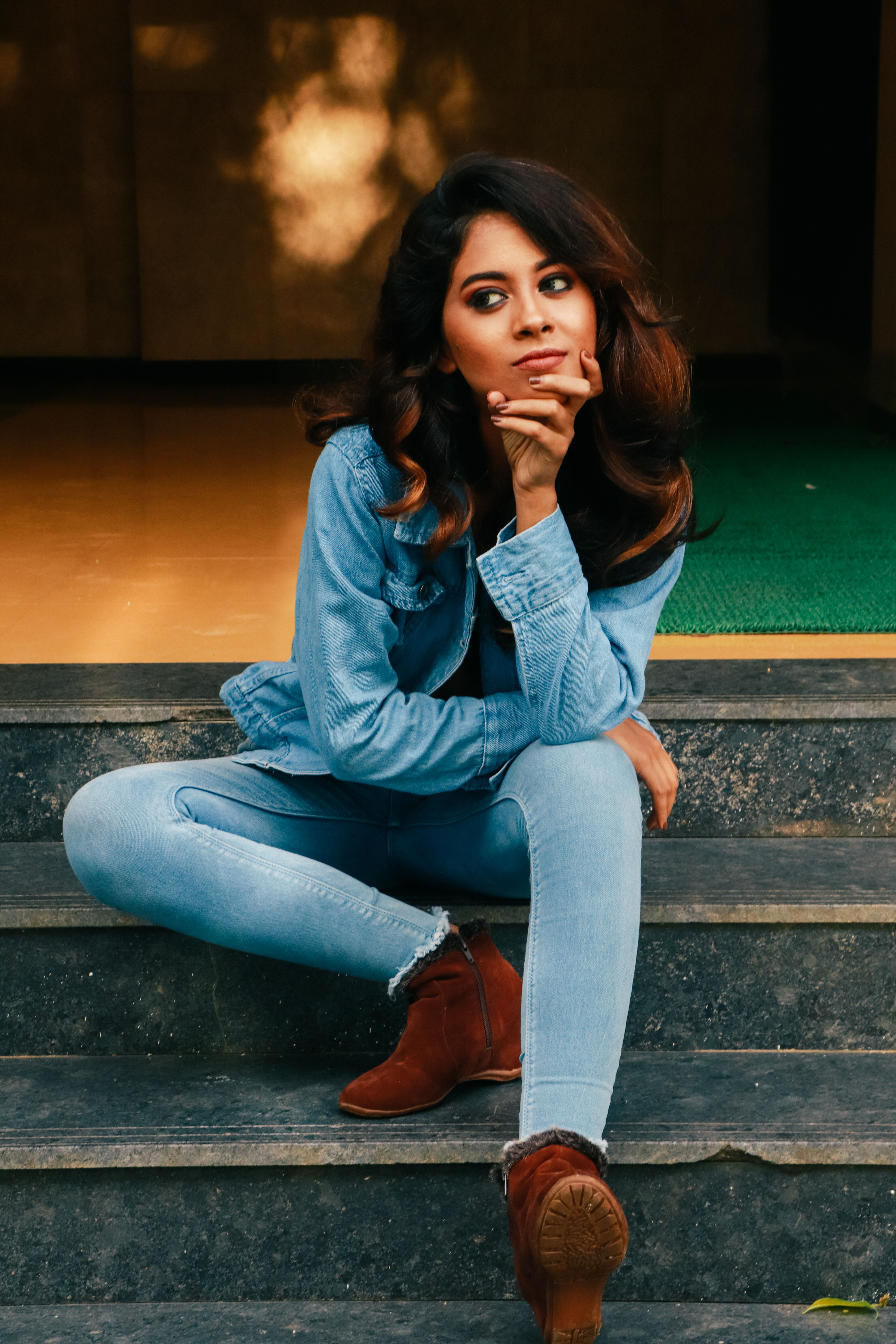 Woman in casual white top and jeans