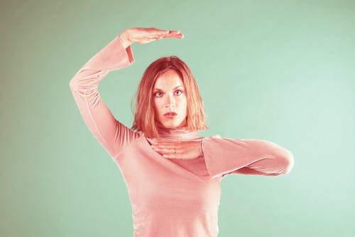 Photo of a Woman Posing with Her Hands