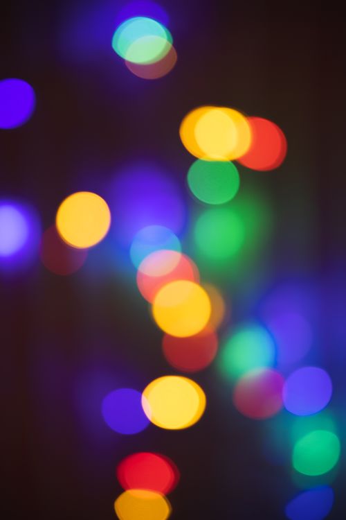 Free Colorful blurred bokeh light pattern, perfect for festive designs and backgrounds. Stock Photo