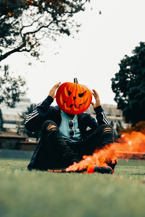 Person with Pumpkin on Head