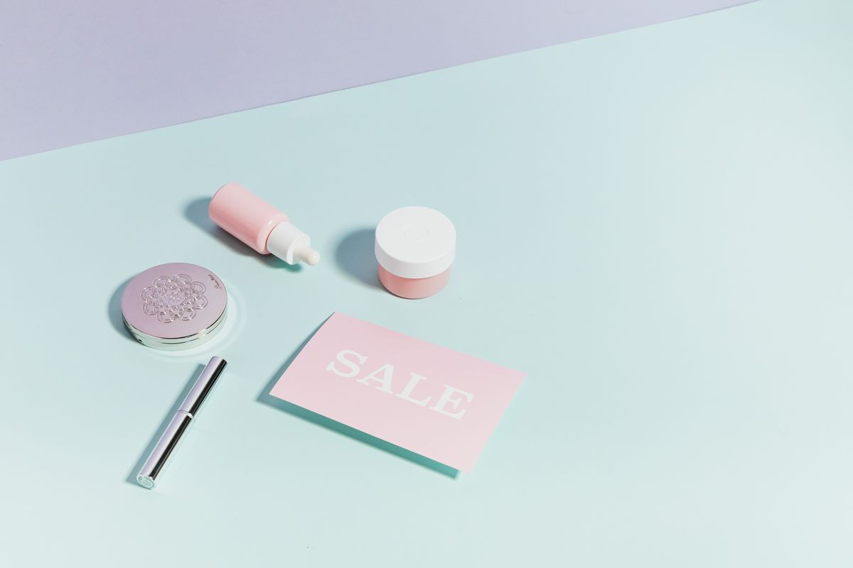 A serum dropper bottle photographed on a neutral background
