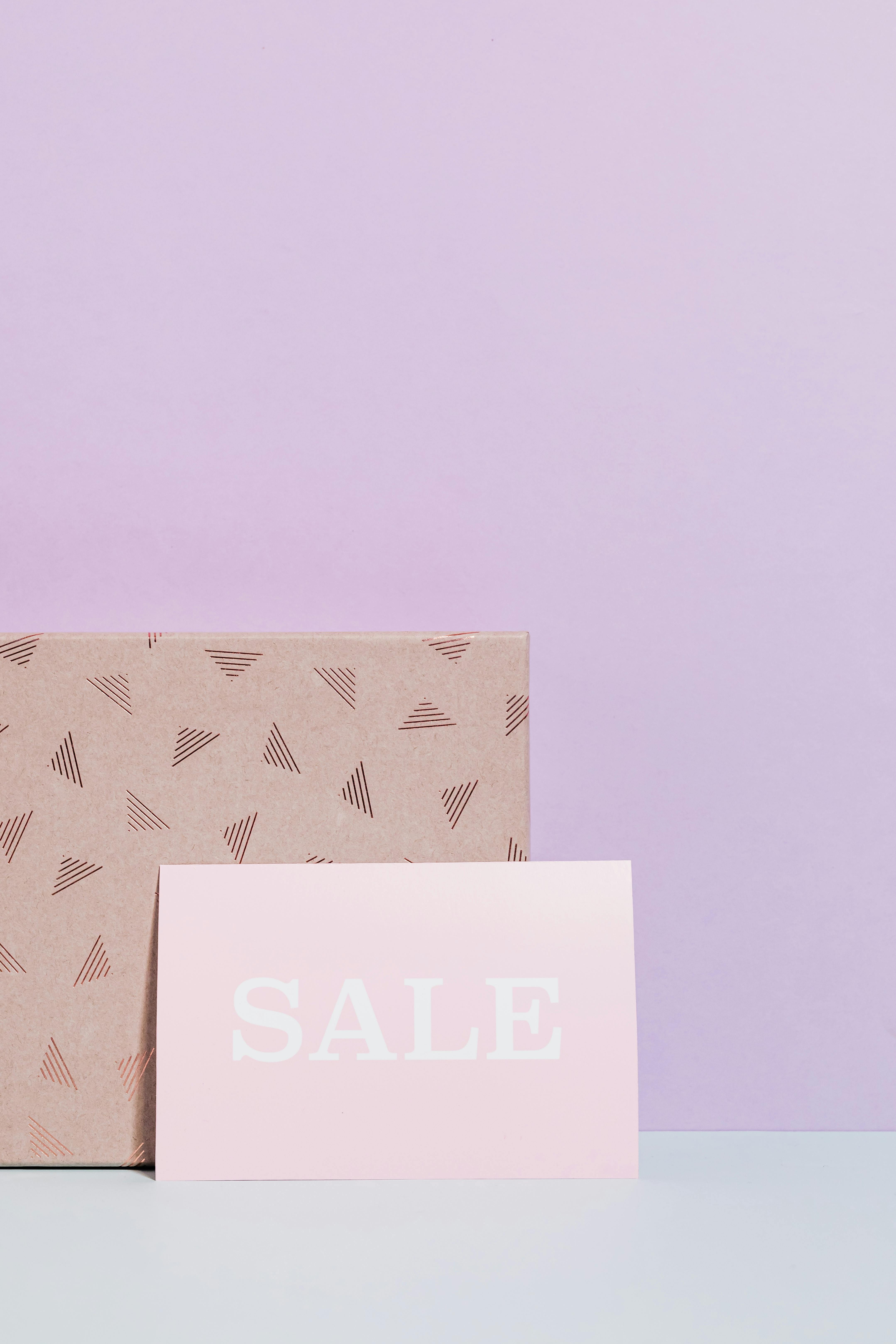 sale sign in pink paper