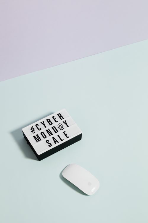 Free Stylish minimalist photo featuring Cyber Monday sale sign with mouse on pastel background. Stock Photo