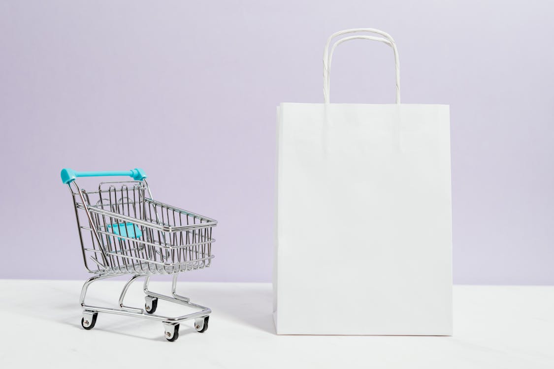 Free Push Cart and a White Paperbag Stock Photo