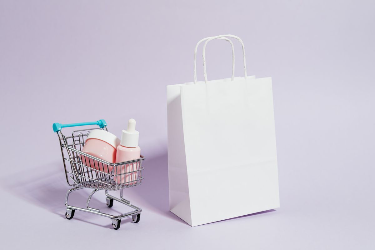 Supermarket aisle with shelves of packaged groceries (stock photograph).