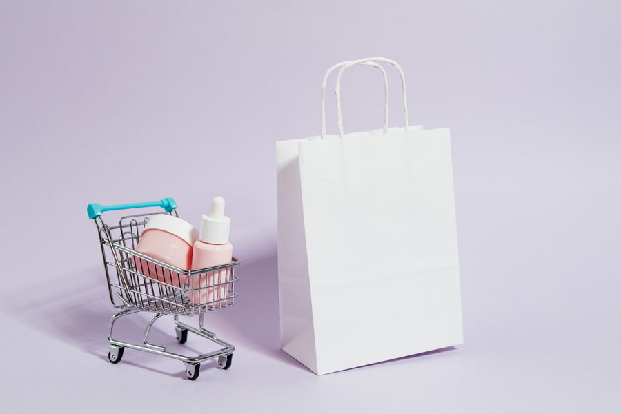 Shopkeeper packing items at counter
