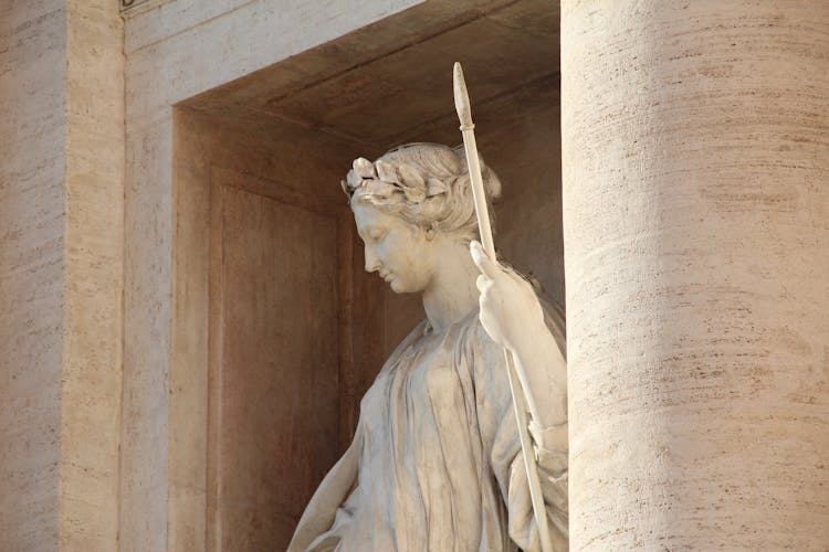 Female Statue With A Spear In Architecture