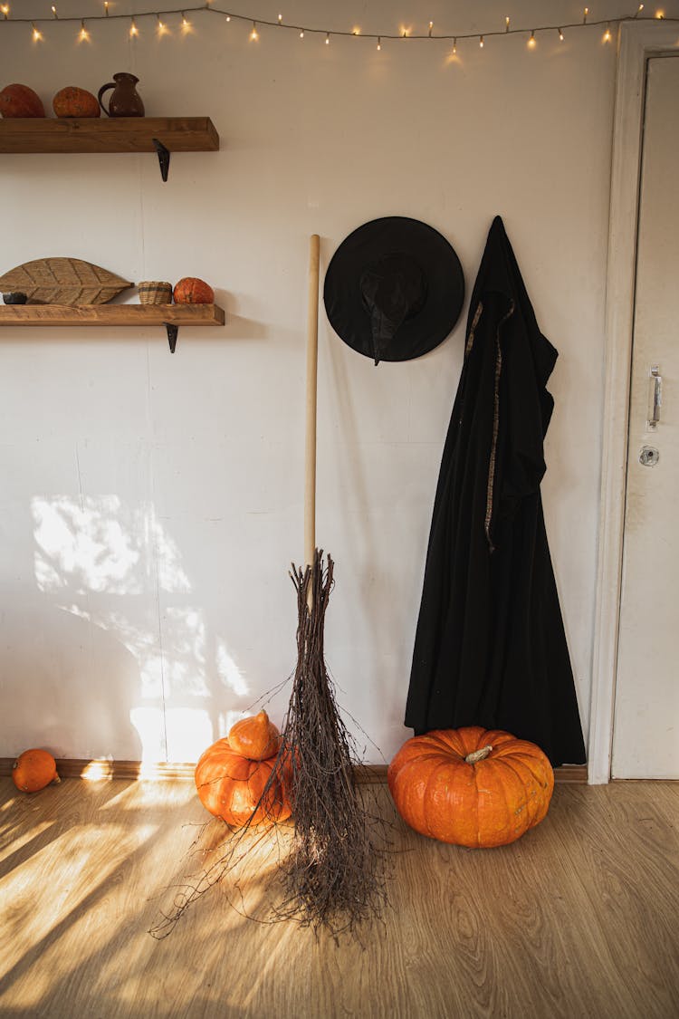 Witch Costume And Pumpkin In A Room