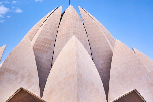 Brown Concrete Building Under the Blue Sky