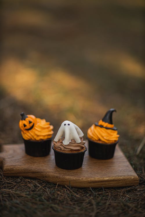 Halloween Cupcakes On Wooden Board