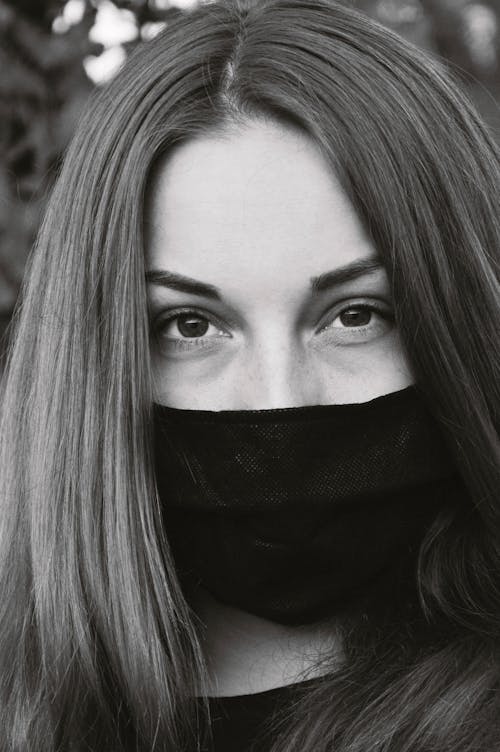 Free Grayscale Photo of a Woman Wearing Face Mask Stock Photo