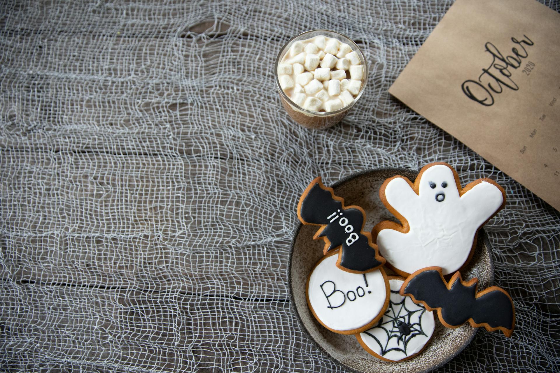 White and Black Halloween Treats On Round Plate