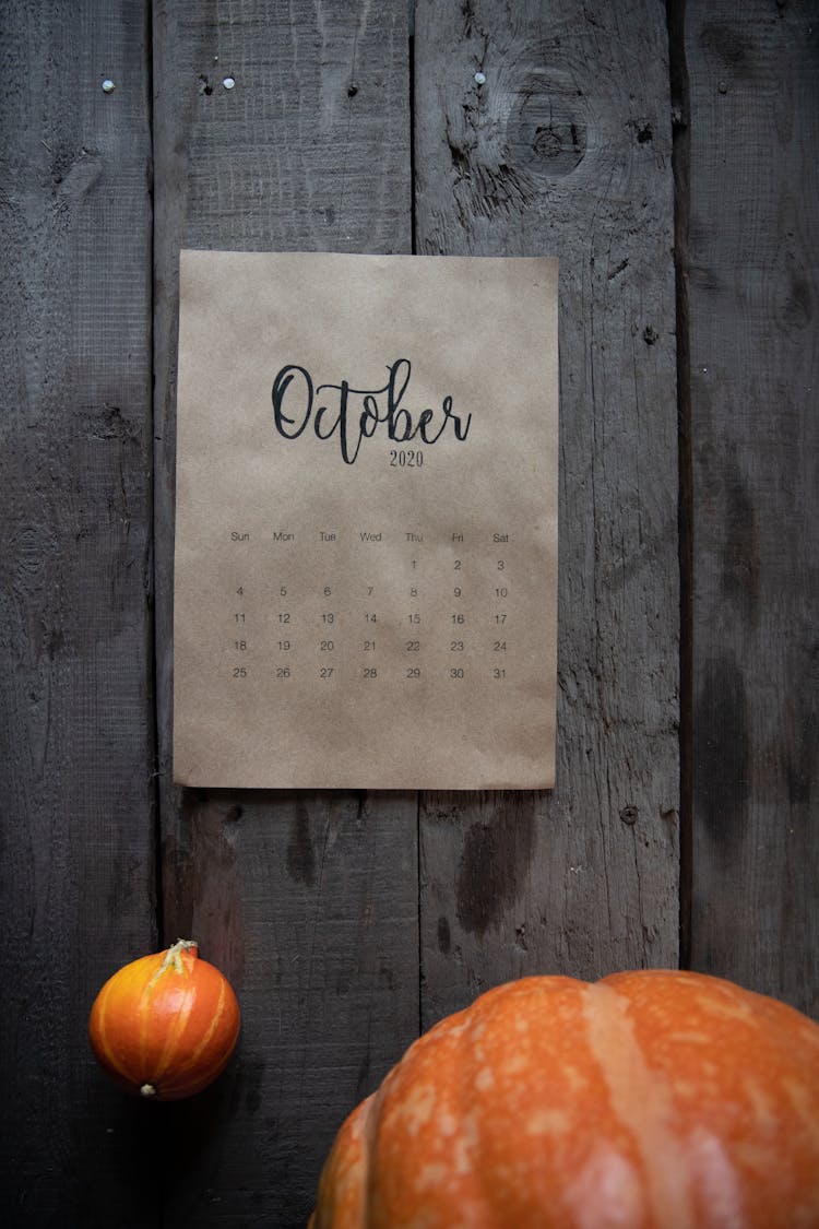 October Calendar On Wooden Wall