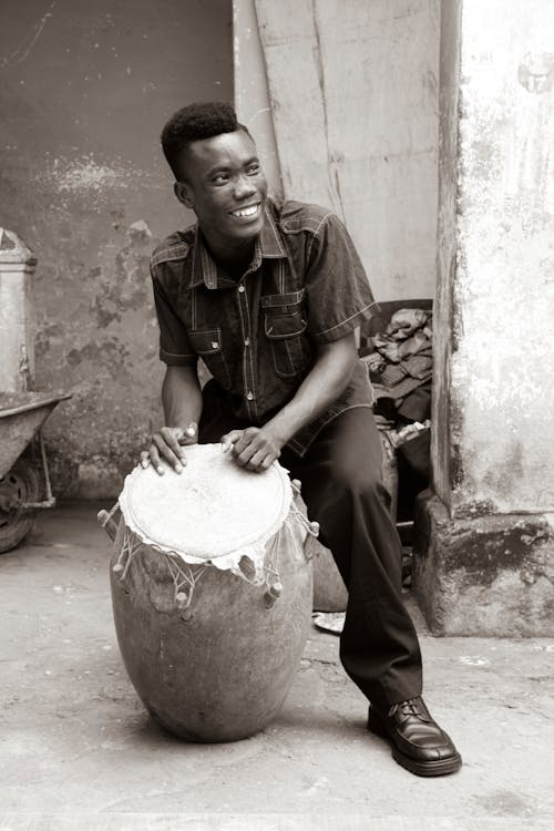 Smiling Man with Drum