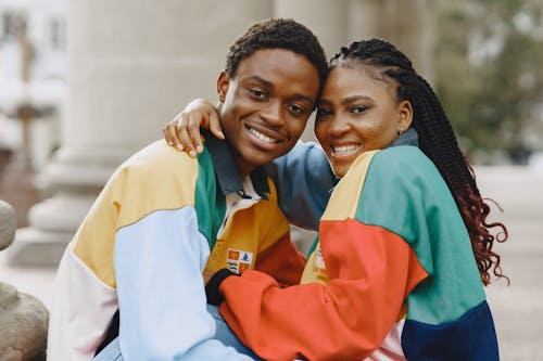 Couple Smiling and Hugging