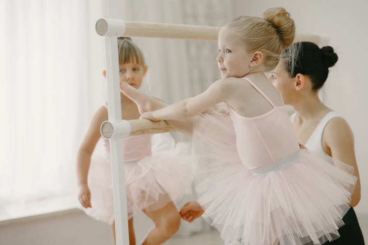 Little Girls Dancing On A Ballet Class