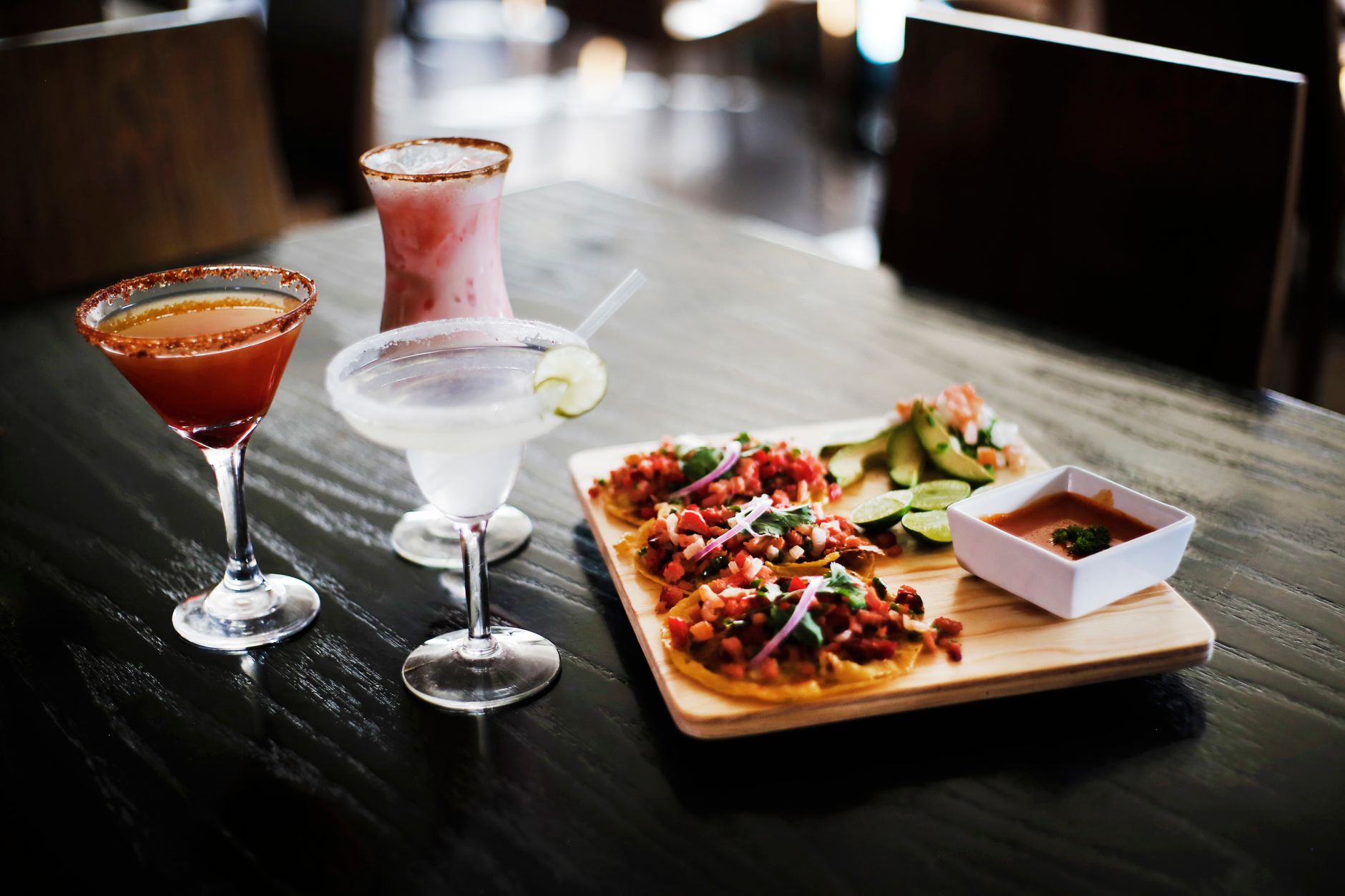 Frozen avocado margarita served with salted rim and lime wedge