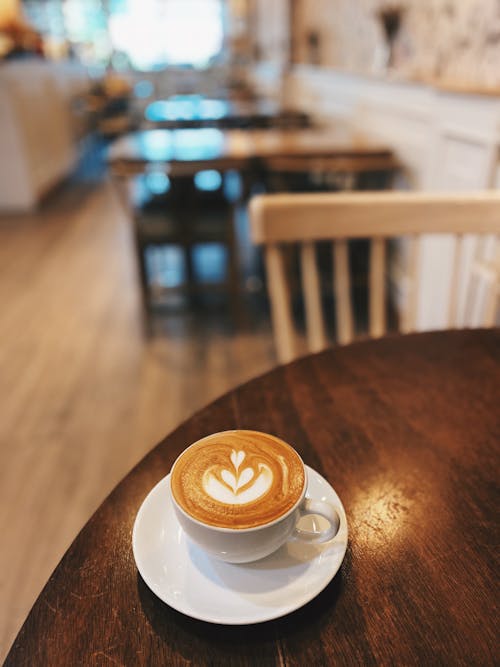 White Ceramic Cup and Saucer of Latte Art