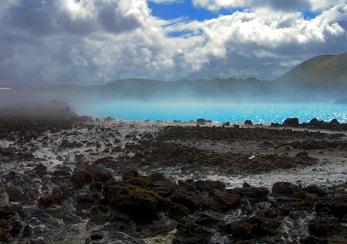 Free stock photo of volcanic rocks in lake