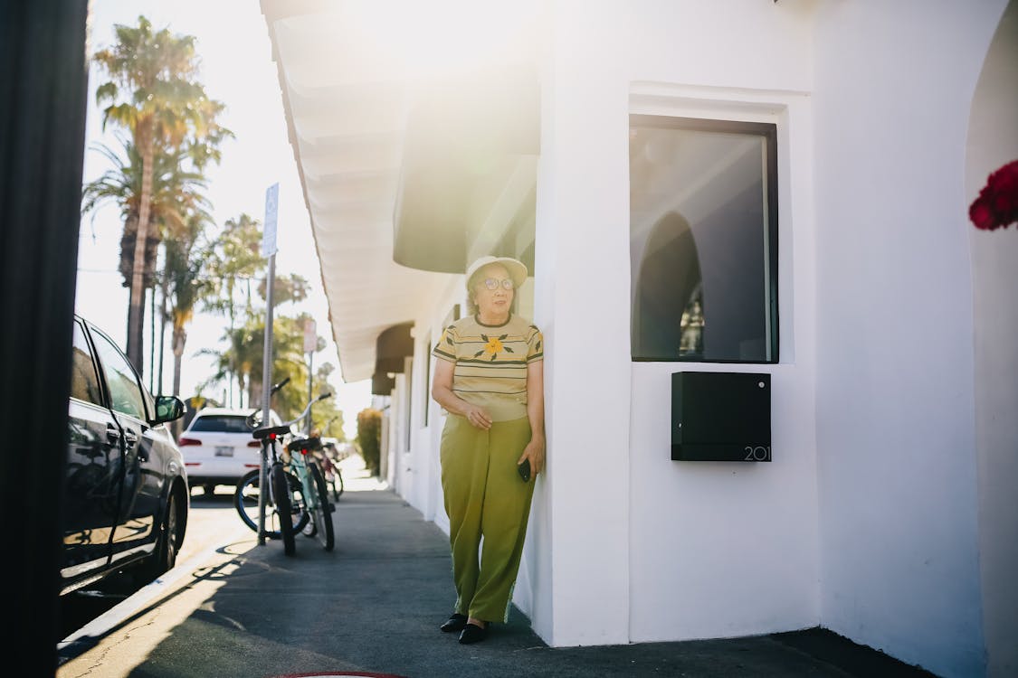 Old Lady Standing on the Corner