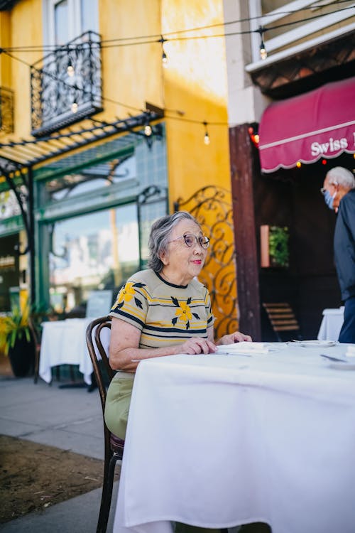 Elderly Woman Waiting For Her Order