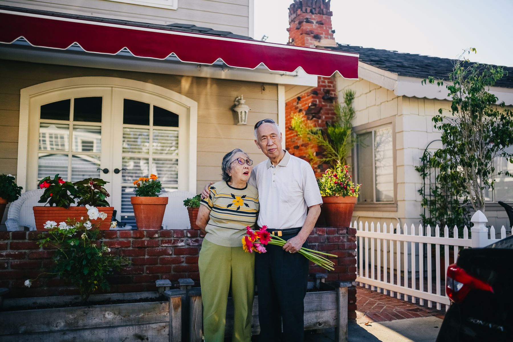 Older couple enjoying life together at their home