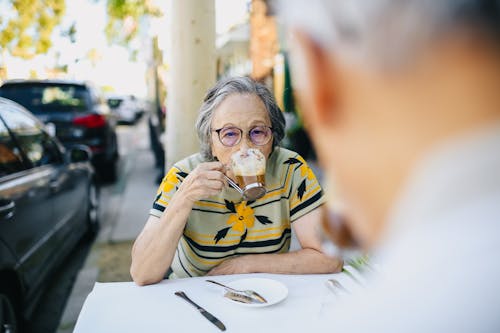 Free Elderly Woman Drinking Hot Chocolate Stock Photo