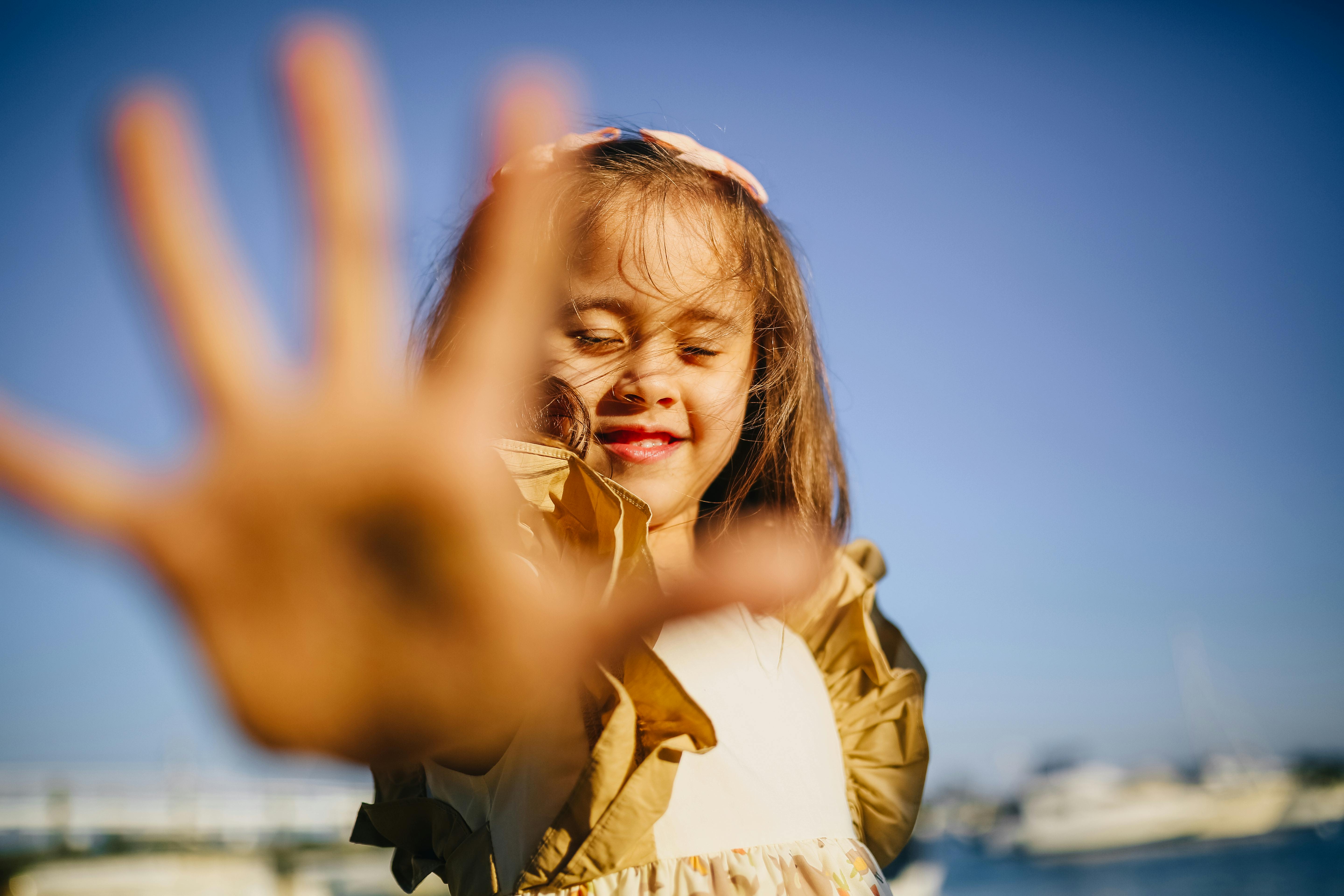 girl showing her hand