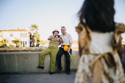 Free Elderly Woman Taking Photo of Her Granddaughter Stock Photo